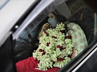 Investigative journalist Rozina Islam sits inside a car after she was granted bail and was released from a women's jail at Kashimpur, Gazipu...