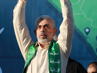 Yahya Sinwar, Palestinian leader of Hamas in the Gaza Strip, greets supporters at a rally following a cease-fire reached after an 11-day war...