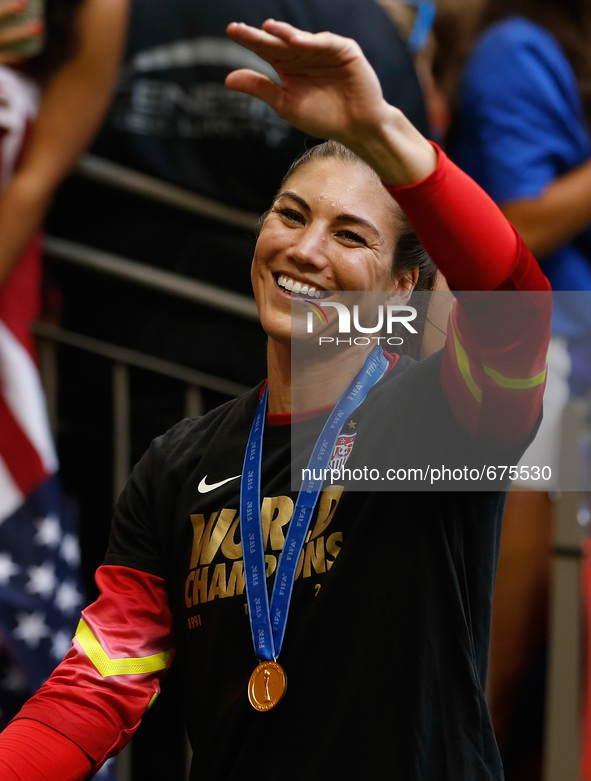 (150706)-- VANCOUVER, July 6, 2015() -- Hope Solo, goalie of the United States, celebrates with supporters after the awarding ceremony for t...