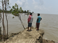 Villagers showing the havoc destruction and broken embankments caused by the cyclone Yaas.   On May 28, 2021 in West Bengal, India. Accordin...