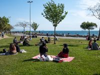 People spend time by the seaside and at the parks in Istanbul, Turkey on May 28, 2021, after the full lockdown has been lifted. Cafes and re...