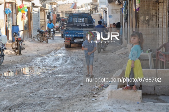 Daily life of displaced Syrians in Karama camps in the northern countryside of Idlib governorate on the Syrian-Turkish border on May 30, 202...