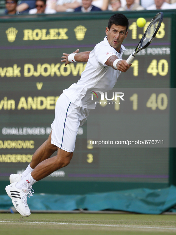 (150707) -- LONDON, July 6, 2015 () -- Novak Djokovic of Serbia hits a return to Kevin Anderson of South Africa during the men's singles fou...