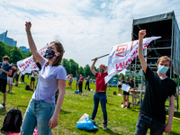 Students are raising their hands in the air, during the Nationwide student strike, organized in The Hague, Netherlands on June 3rd, 2021. (