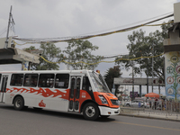 Public transportation circulates in an emergency zone on Avenida Tláhuac in Mexico City, after the collapse of a column on Line 12 of the Me...