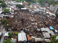 At least 500 shanties were gutted as a slum in Mohakhali area in Dhaka, Bangladesh, caught fire on June 7, 2021.The fire started at Mohakhal...