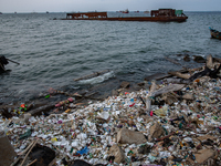 Styrofoam and the wreckage of a ship at the shore in the north of Indonesia's capital Jakarta on 8 June 2021. As people around the world mar...