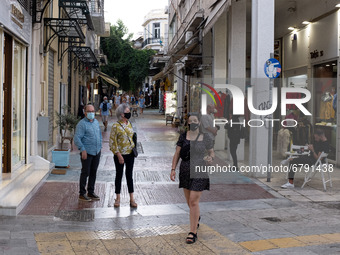 People are walking wearing protected mask near Monastiraki square in Athens, Greece on June 9, 2021. (
