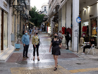 People are walking wearing protected mask near Monastiraki square in Athens, Greece on June 9, 2021. (