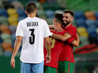Bruno Fernandes of Portugal (R ) celebrates with Pedro Goncalves after scoring his second goal during the international friendly football ma...