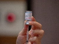  A woman holds a bottle of Moderna vaccination and a medical syringe on June 11, 2021 in Taipei, Taiwan. Taiwan Central Epidemic Command Cen...