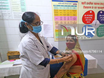 A beneficiary receive the dose of Covid-19 vaccine during a special one-day vaccination drive campaign ,at Banipark Dispensary in Jaipur, Ra...