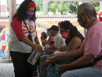 Persons attend a Registration place to joins as  militants of the United Socialist Party of Venezuela (PSUV) at the liberating municipality...