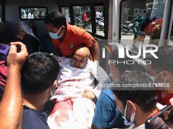 Injured being taken to SDH Sopore after Militants attacked Police party in Sopore, Jammu and Kashmir, On 12 June 2021. Many killed and many...