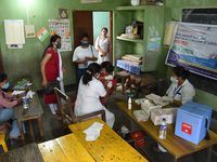 People getting vaccine against COVID-19 coronavrius disease, at a vaccination centre in Guwahati, Assam, India on Saturday, June 12, 2021....