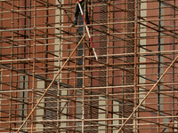Labourers work at a construction site after authorities announced various relaxations as a part of unlocking the national capital post lockd...