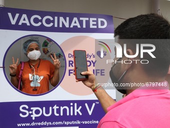 An Corporate worker  selfie  after receiving a dose of a Russian Covid-19 Vaccine  Sputnik V at a vaccination centre on June 12,2021 in Kolk...