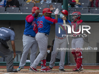 Johan Mieses #36 of the Dominican  Republic reacts after hitting a home run during exhibition  match heading to the olympic games Tokyo 2021...