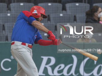 Gustavo Nuñez #2 of the Dominican  Republic hits a home run during exhibition  match heading to the olympic games Tokyo 2021  between the Do...