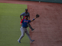  player of the Dominican  Republic makes a catch  during exhibition  match heading to the olympic games Tokyo 2021  between the Dominican  R...