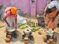 Hindu women cooking pongala during the Attukal Pongala Mahotsavam Festival in the city of Thiruvananthapuram (Trivandrum), Kerala, India, on...