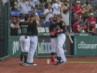 Adrian Gonzalez #23 of Mexico team celebrates his home run during the exhibition match  between the Venezuela  and the Mexico at Alfredo Har...