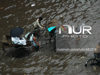 Waterlogged city of joy Kolkata Road following heavy rain on July 10,2015 in Kolkata, India (