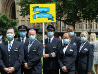 LONDON, UNITED KINGDOM - JUNE 23, 2021: Pilots and cabin crews join hundreds of protesters representing the travel industries protesting out...