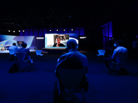 Congress attendants listening the virtual conference of Telenor Digital CEO Stig Waagbo, during the Mobile World Congress (MWC) Barcelona, o...