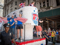 July 10, 2015 - New York, New York - Members of the women world cup championship team ride a float up Broadway.  The 2015 Women's World Cup...