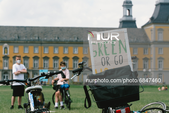 a sigh of go green is seen during the Fridays for future protest in Bonn, Germany on July 2, 2021 for better climate protection 