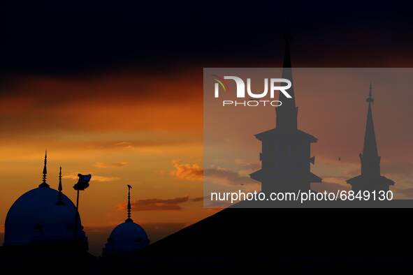 Jama Masjid (Grand Mosque) is silhouetted during sunset in Sopore, District Baramulla, Jammu and Kashmir, India on 03 July 2021. 