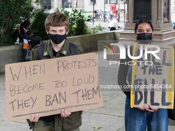 LONDON, UNITED KINGDOM - JULY 05, 2021: Demonstrators gather in Parliament Square for 'Kill the Bill' protest to oppose government’s Police,...
