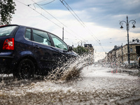 Streets of Podgorze district are flooded with water after heavy rain shower in Krakow, Poland on July 9, 2021.  (