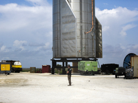 A SpaceX employee stands next to Starship SN15 on July 13th, 2021 in Boca Chica, Texas.  (