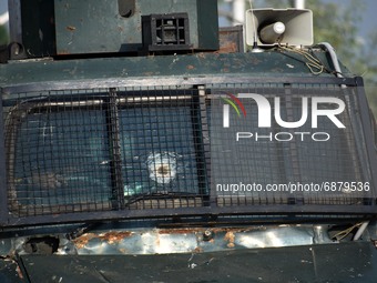 An armoured vehicle is stationed at the check point during an encounter at Alamdar Colony Danmar, Syedpora area of Srinagar,Kashmir on July...