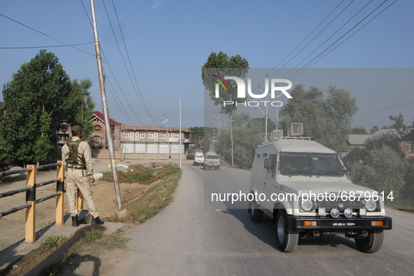 Indian troops leave from the encounter site after the military operation came to end in Srinagar, Indian Administered Kashmir on 16 July 202...