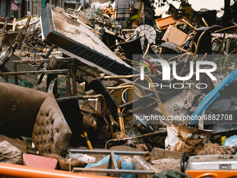 a piled of furniture debris is seen in Bad Muenstereifel, Germany on July 17, 2021 as heavy rainfalls causes serious damages in several part...