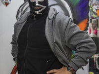 Wrestling legend 'El Rayo de Jalisco' poses for photos during an autograph signing to fans  as part of his promotion event at Psy'kaza Decor...