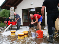 Roads and households in Krzyszkowice near Krakow were flooded after heavy rain during the night in the Lesser Poland Voivodship. Glogoczow,...