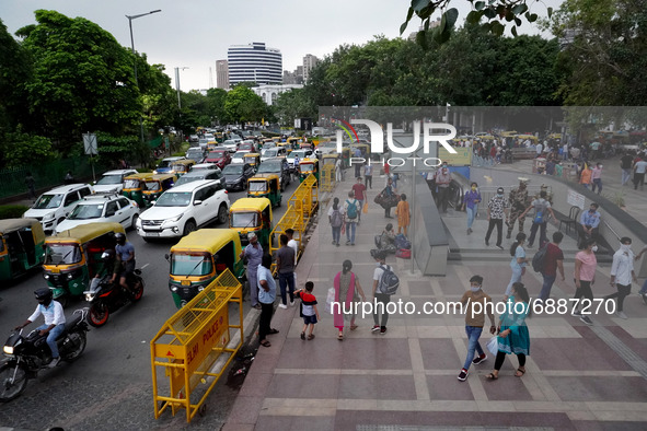 Heavy rush of crowd is seen as weather gets pleasant ahead of rain shower at Connaught Place, in New Delhi, India on July 18, 2021. Accordin...