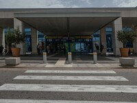 Entrance of the departure hall of Athens Airport. Passengers with face masks as seen at Athens International Airport ATH LGAV Eleftherios Ve...