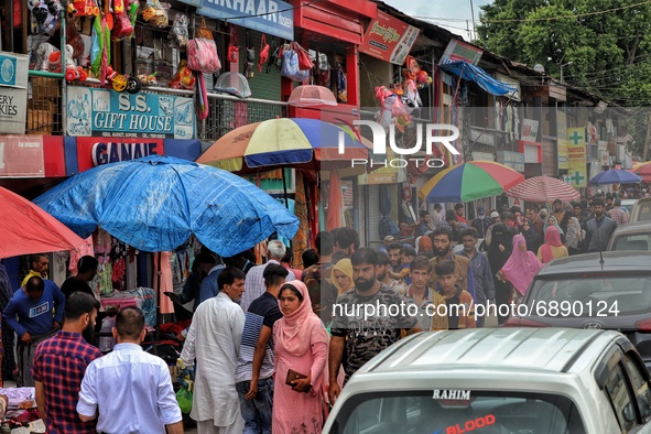 Huge rush of people is seen at Iqbal Market Sopore amid COVID-19 Coronavirus Pandemic ahead of Muslim festival Eid-Ul-Adha in Sopore, Distri...