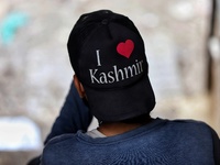 I Love Kashmir is written on the cap of a boy as he sits on the stairs of a Commercial complex in Sopore District Baramulla Jammu and Kashmi...
