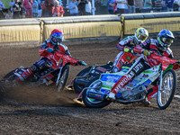  Hans Andersen  (Blue) leads Tom Brennan  (Yellow) and Ulrich Ostergaard  (Red) during the SGB Premiership match between Peterborough and Be...