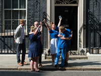 LONDON, UNITED KINGDOM - JULY 20, 2021: NHS staff reacts after delivering a petition with 800,000 signatures to 10 Downing Street demanding...