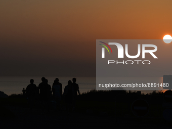 A sunset seen near Arromanches during a sunset.On Wednesday, July 20, 2021, in Arromanches, Calvados, Normandy, France. (