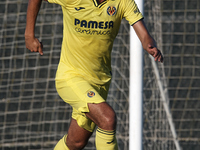 Dani Parejo of Villarreal runs with the ball during the Pre-Season friendly match between Valencia CF and Villarreal CF at Oliva Nova Beach...