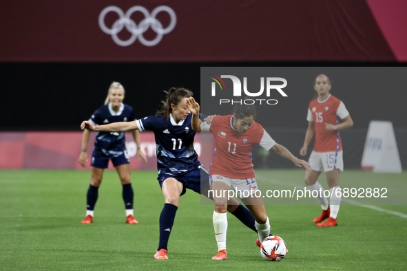 (11) WEIR Caroline of Team Great Britain is challenged by (11) LOPEZ Yessenia of Team Chile during the Women's First Round Group E match bet...