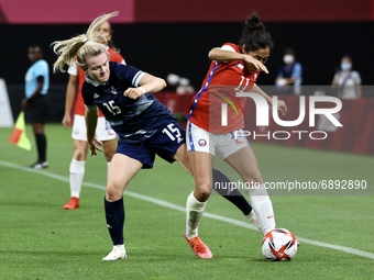 (15) Lauren Hemp of Team Great Britain is challenged by (11) LOPEZ Yessenia of Team Chile during the Women's First Round Group E match betwe...